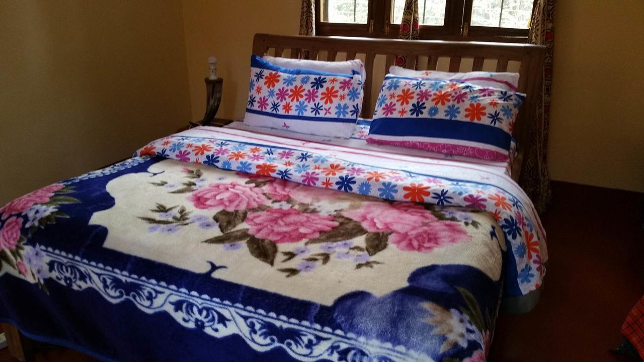 Mama Simba Bed And Breakfast Moshi Моши Экстерьер фото